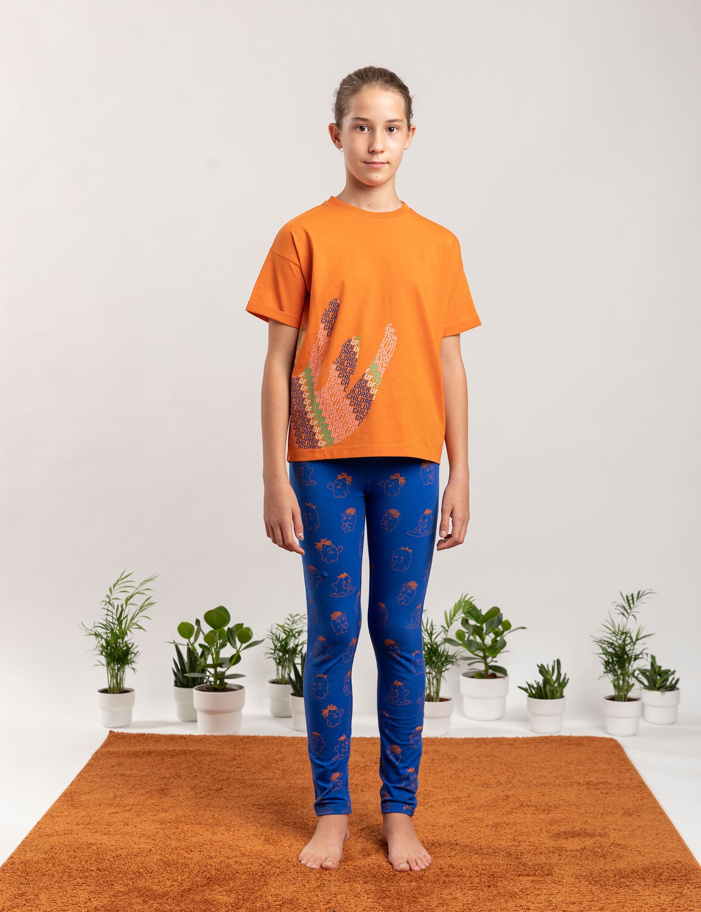 CAMISETA COSMOS CHILDREN OF THE REVOLUTION NARANJA